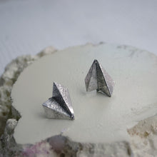 Load image into Gallery viewer, Handmade, fan shaped geometric stud earrings. Origami paper style with rough, raw rustic, surface texture. Made in Copenhagen recycled silver.